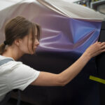 a girl doing car wrapping